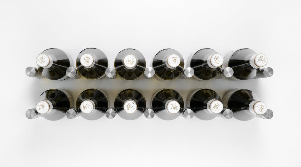 Beta Bloc Wine Pegs - Installed on White Wood Wall